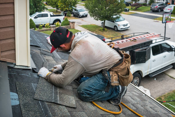Professional Roofing technician working in Alma, MO